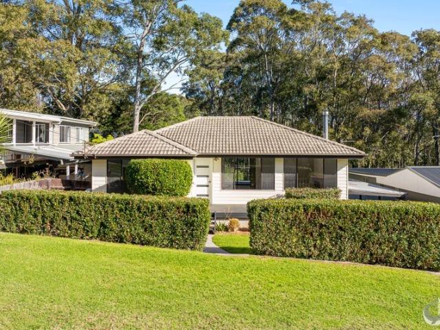 Narooma Coastal Lifestyle Updated Family Home with Inlet Views & Versatile Living