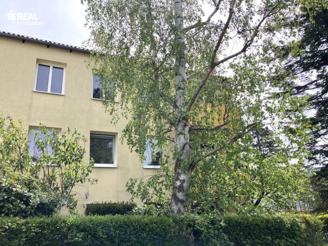 Wo der Tag mit Grün beginnt – 3 Zimmer Wohnung mit Balkon und Garagebplatz