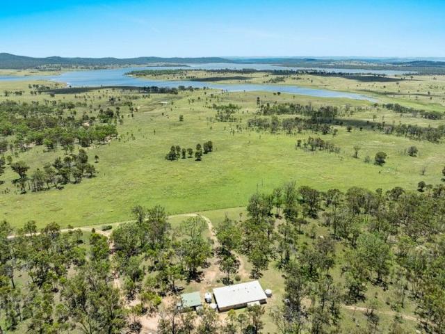Nature Retreat with Water Views of Lake Leslie on 98 Acres