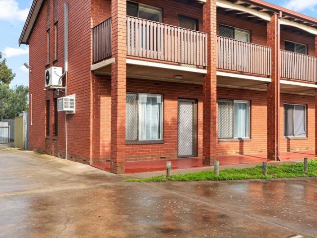 Neat, Modern Low Maintenance Living in a Well Kept Group & Tucked away on side Entrance