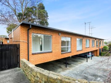 Neat & Affordable Unit in Convenient Location