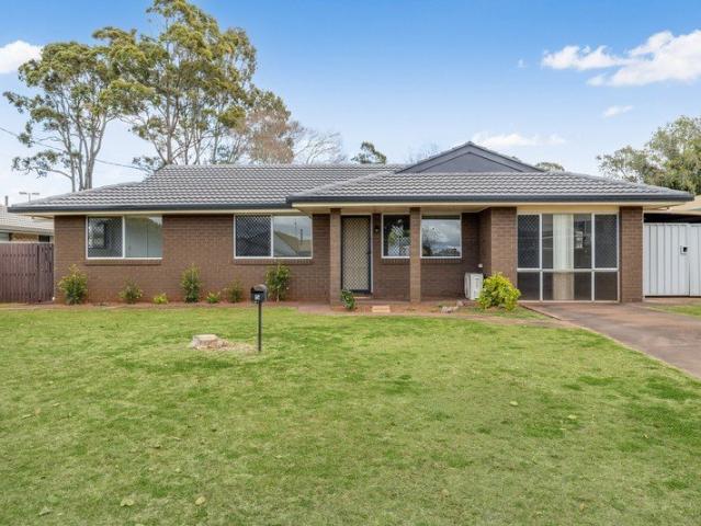 Neat and Tidy Brick Home in a Convenient Location