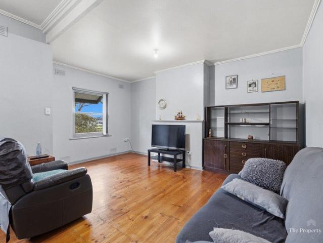 Neat and Tidy Duplex with Spacious Corner Allotment