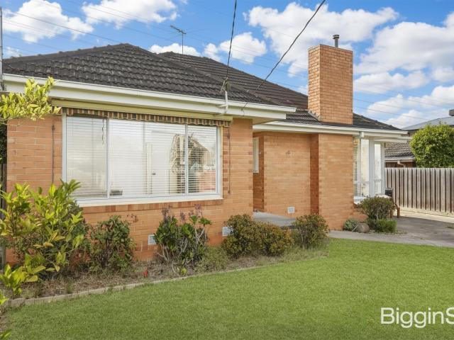 Neat and Tidy Family Home with Generous Living Spaces in Great Location