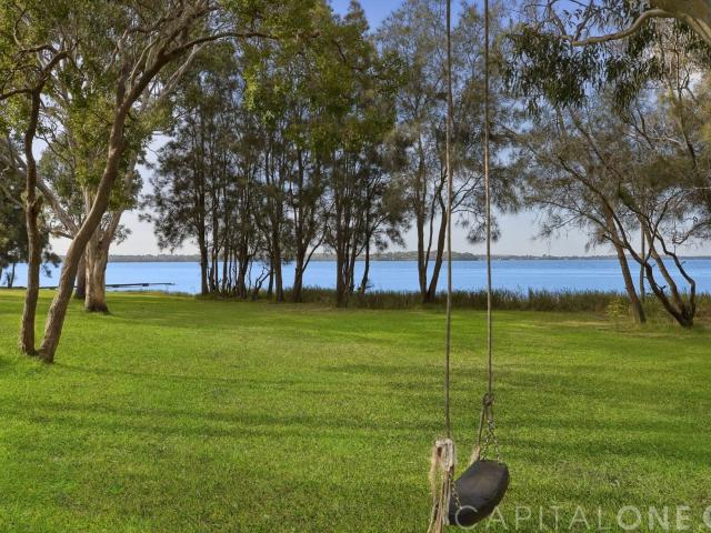 NEAT AND TIDY TWO BEDROOM HOME RIGHT ON THE WATER