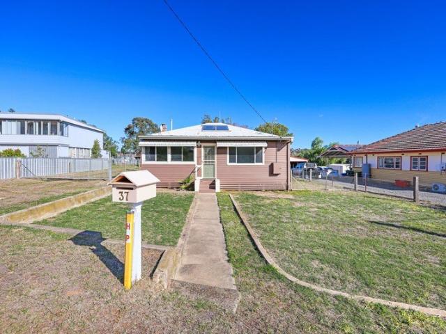 Neat and Tidy Three Bedroom Home