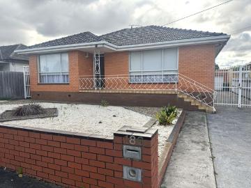 NEAT AND TIDY THREE BEDROOM HOME WITH SUNROOM