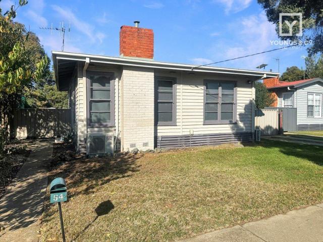 Neat and Tidy Three Bedroom Home Close to GV Health!