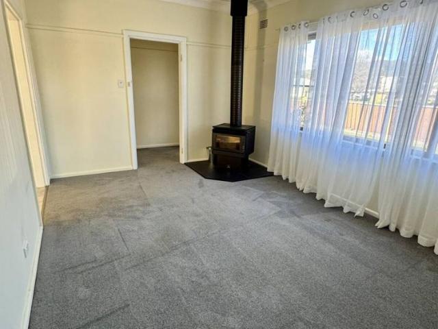 Neat and Tidy 3 bedroom home + study with sheds