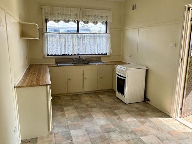 Neat and Tidy 3 bedroom home + study with sheds