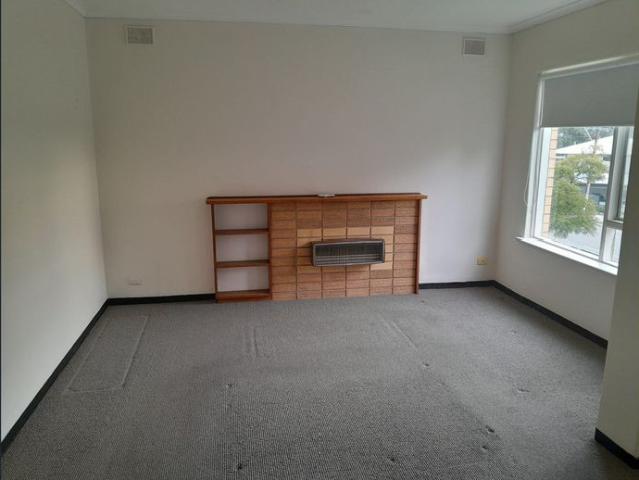 Neat and bright two bedroom upstairs unit in a convenient location