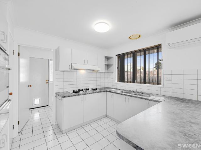 Neat and spacious three bedroom house with large rear shed