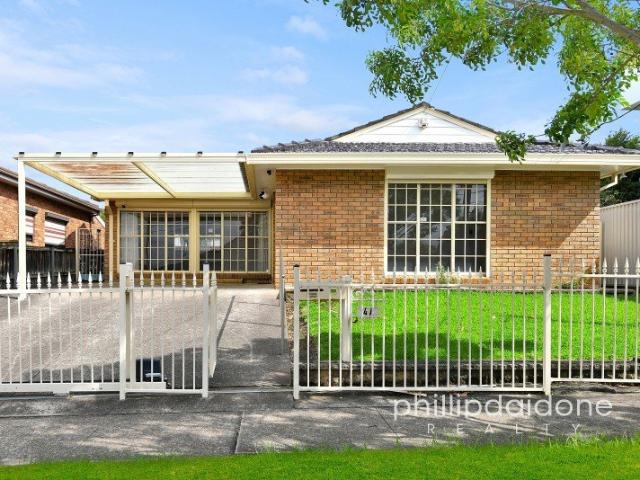 NEAT BRICK HOME. EASY MAINTENANCE.