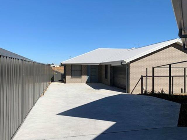 Neat & Comfortable Three Bedroom Living in a Quiet Location