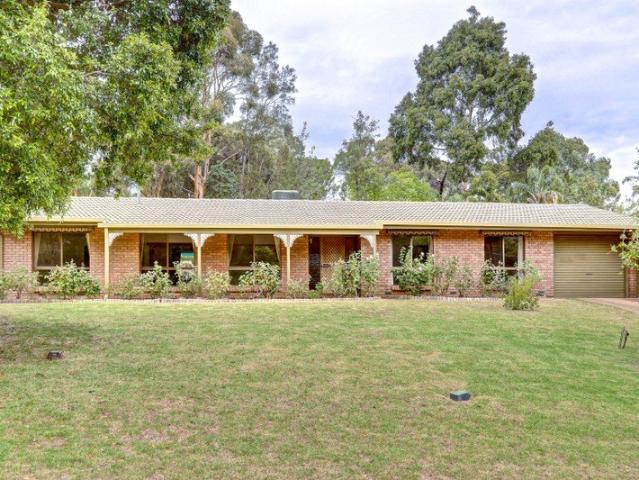 Neat Family Home With Large Backyard