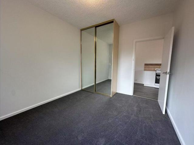 Neat & Freshly Updated Downstairs Unit in Prime Location