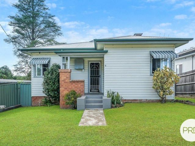 Neat Kendall Cottage Brimming with Potential