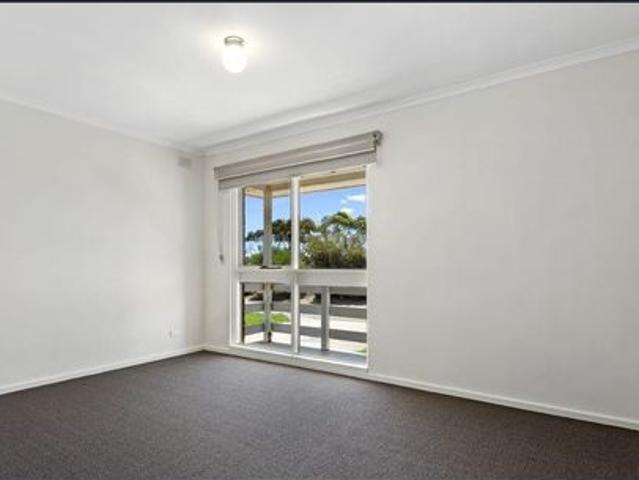 Neat & Low Maintenance Unit in a Convenient Coastal Location