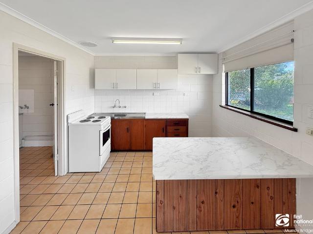 Neat, Low Maintenance Unit in a Quiet Setting