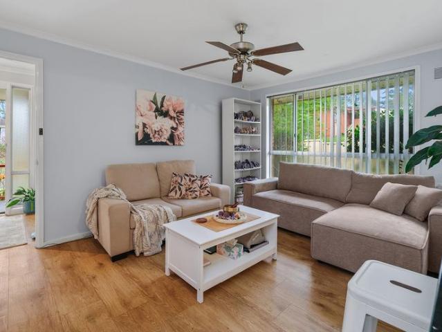 NEAT, LOW MAINTENANCE HOME WITH SIDE ACCESS