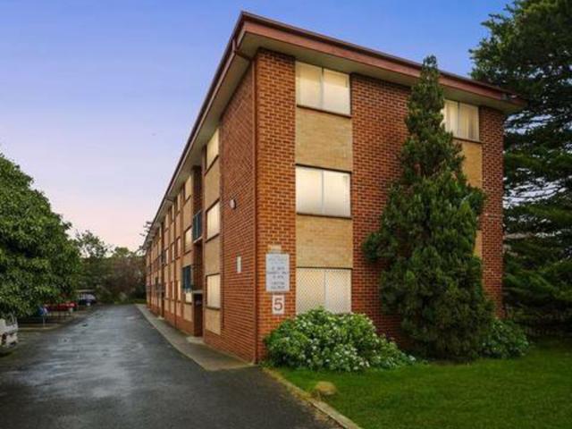 Neat Two Bedroom Top Floor Unit