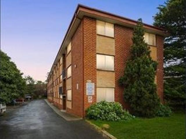 Neat Two Bedroom Top Floor Unit