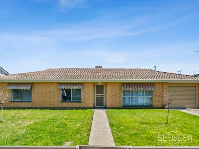 Neat Three Bedroom Home in Convenient Location