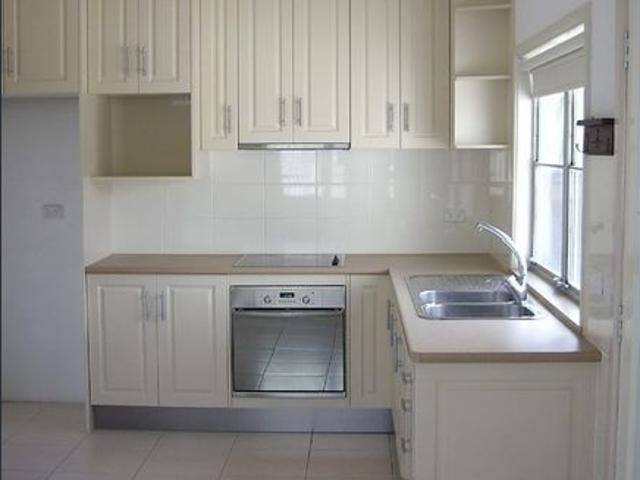 Freshly painted 3 bedroom home with tiled floors through out