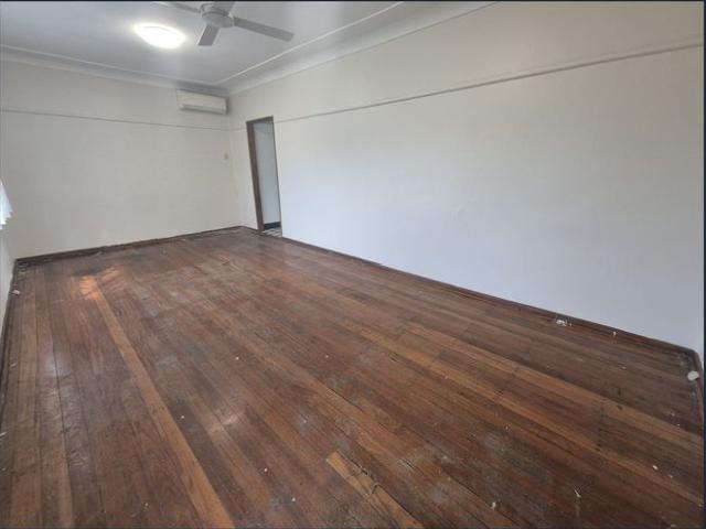 Neat & Tidy 3 Bedroom Home with Spacious Backyard!