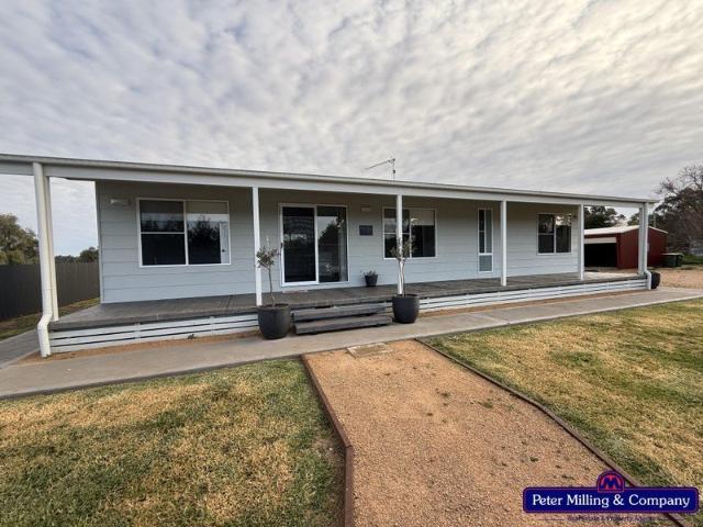 NEAT & TIDY HOME WITH SPACIOUS SHED