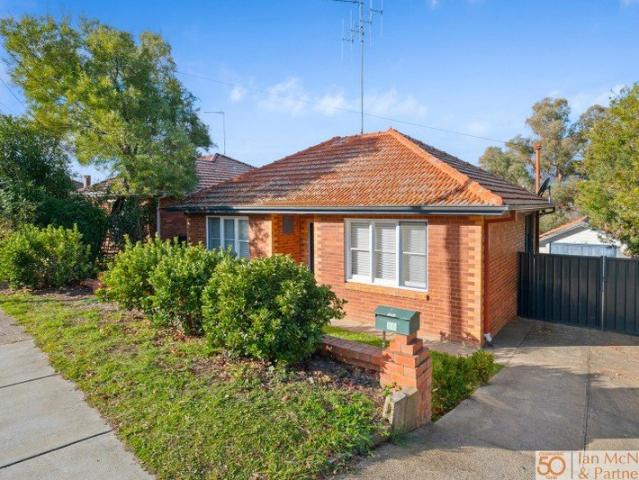 UNDER APPLICATION* Neat & Tidy Home in a Convenient Location