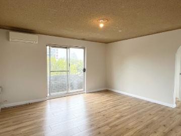 Neat unit positioned on the top floor
