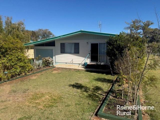 Neat, Well Planned Home with Exceptional Shed Space