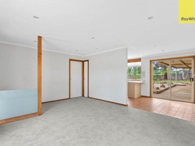 NEAT WITH A LARGE WELL ESTABLISHED YARD