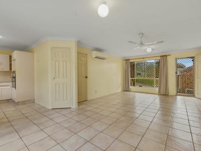 Neat 2 Bed 1 Bath Single Level with 3 car Parking Brick & Tile Townhouse