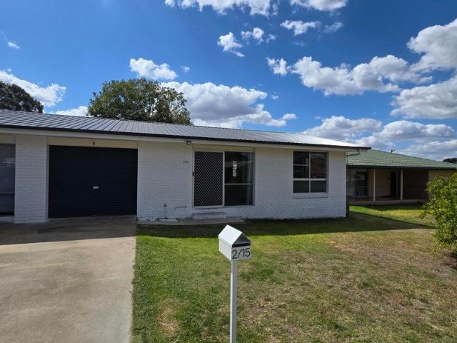 Neat 2 Bedroom Unit with Fully Fenced Yard