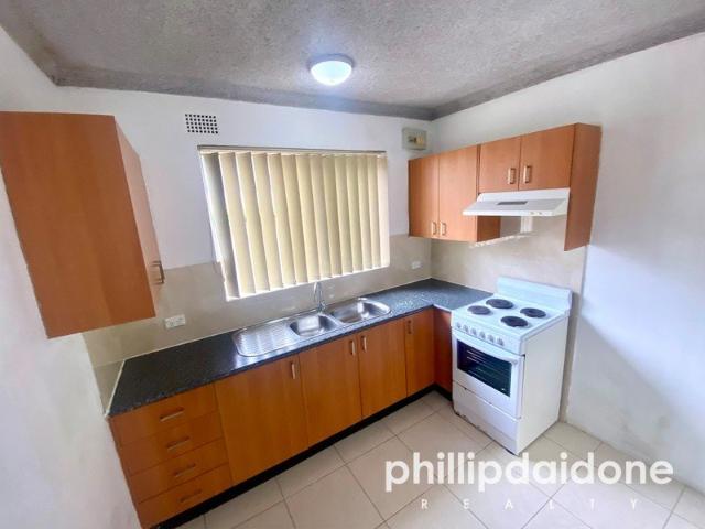 NEAT 2 BEDROOM GROUND FLOOR UNIT.