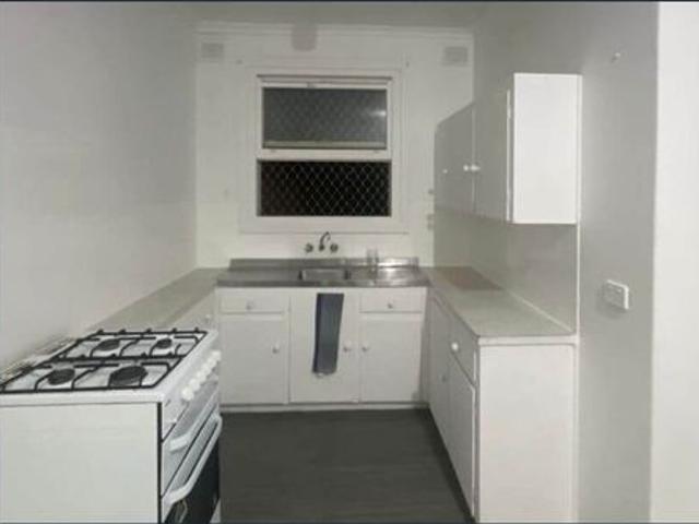 Neat 2 Bedroom Home with Spacious Backyard