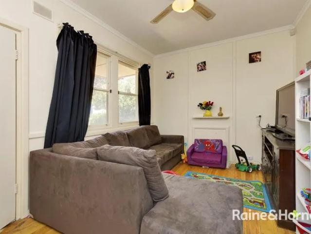 Neat 3 bedroom home with large back yard