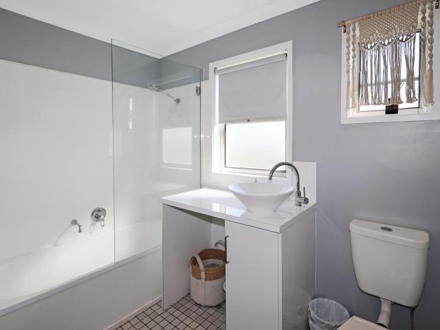 Neat 4 Bed Home with Entertaining Space and Rear Access