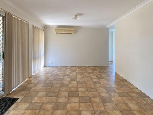 Neat 4 Bedroom Home with Monthly Lawn Mowing Included