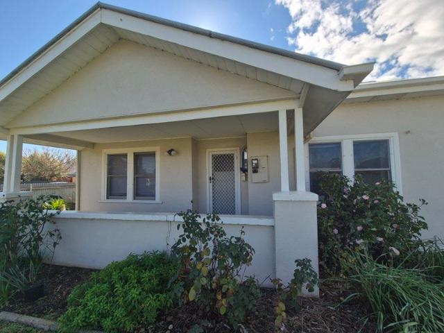 Neatly presented 2 bedroom home within easy walking to Primary School