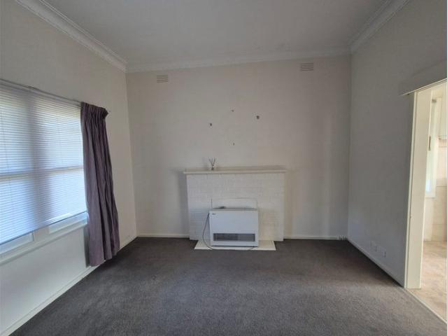 Neatly presented 2 bedroom home within easy walking to Primary School
