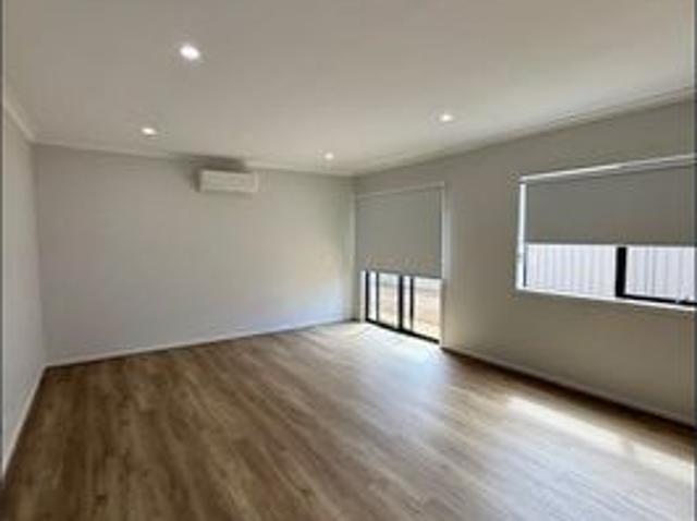 Near new 4 bedroom family home with 2 living spaces!