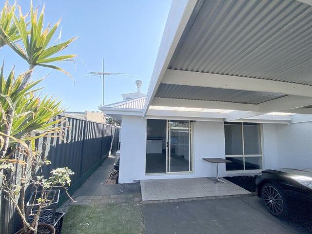 Near New 1 Bed, 1 Bath Executive Ground Floor Unit + Assigned Car Parking Space