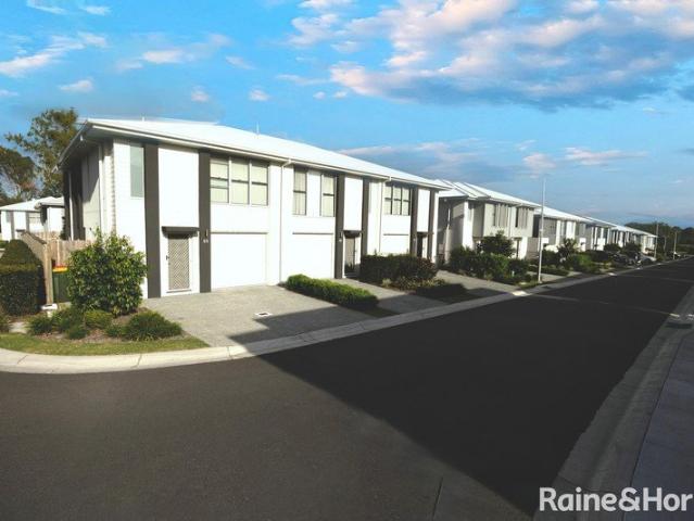 NEAR NEW TOWNHOUSE WITH DOUBLE DRIVEWAY AND SINGLE GARAGE