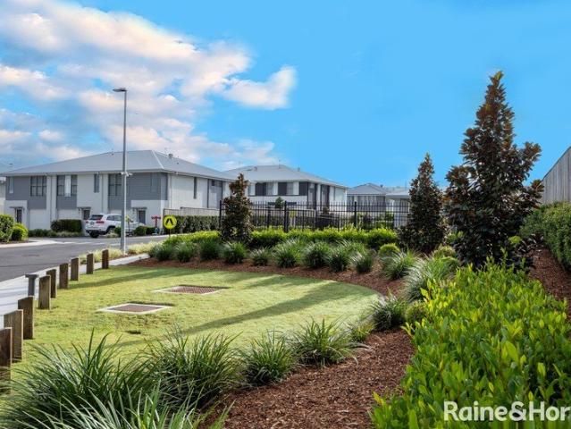 NEAR NEW TOWNHOUSE WITH DOUBLE DRIVEWAY AND SINGLE GARAGE