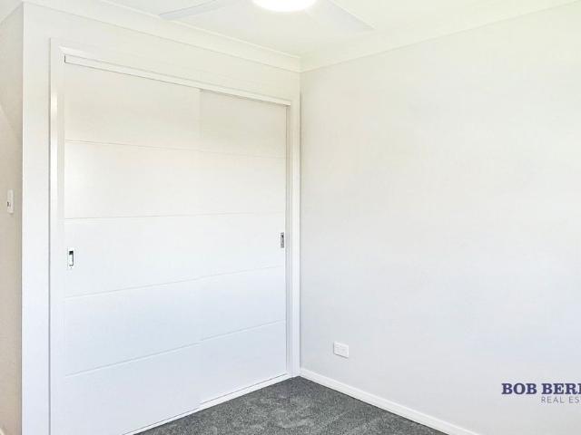 Near New Two Bedroom Duplex with Private Yard