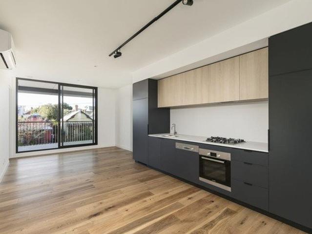 Near New and Spacious with Large Balcony!