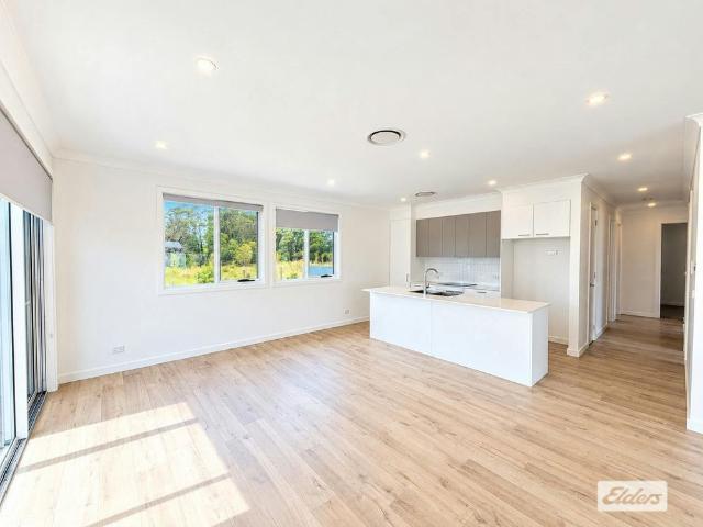 Near New, Architecturally Designed Villa with Spacious Yard